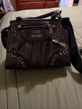 Steve Madden Black Leather Messenger with Grommet Accents